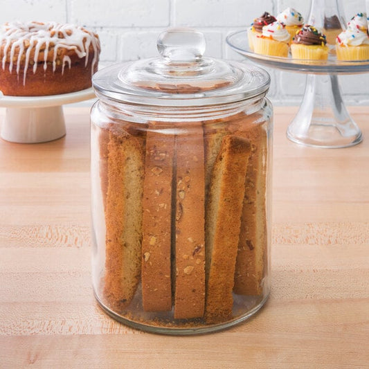 A Choice 0.5 gallon glass jar filled with crackers on a table.
