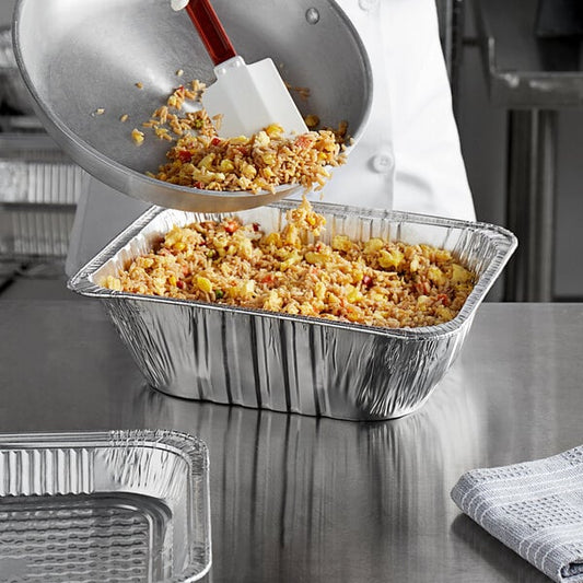 A foil pan filled with food.