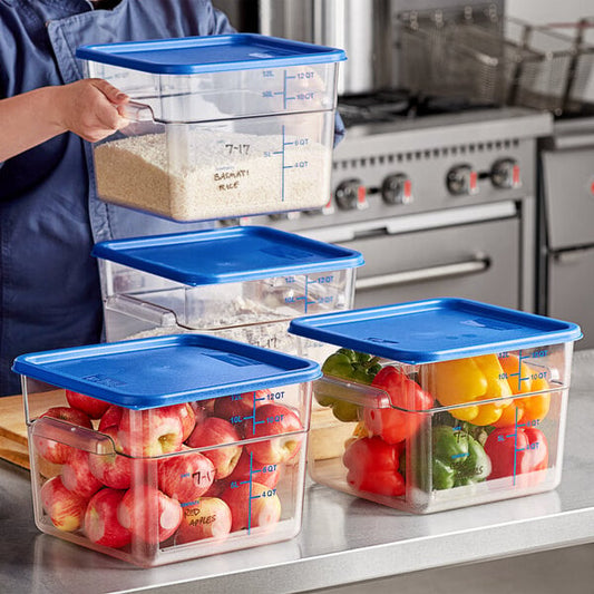 A woman putting apples into a Vigor food storage container.