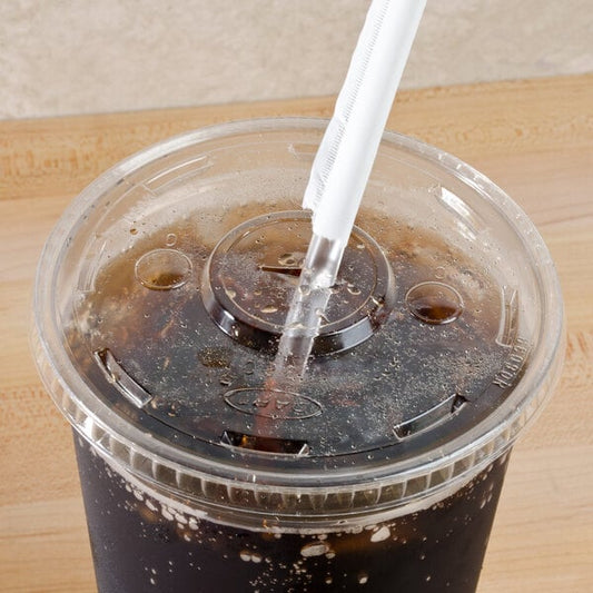 A Dart clear plastic lid with a straw slot on a plastic cup with a straw in it.
